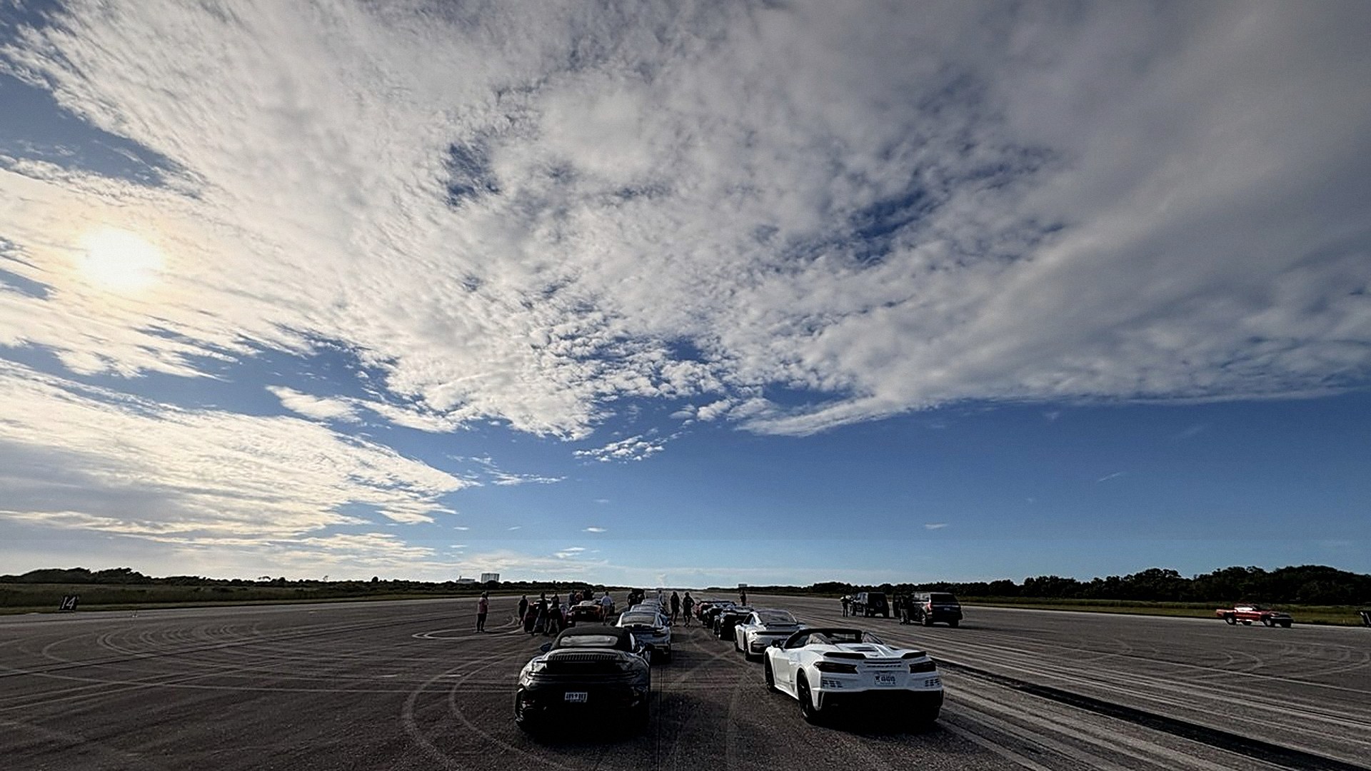Lineup of sports cars on the runway at the track
